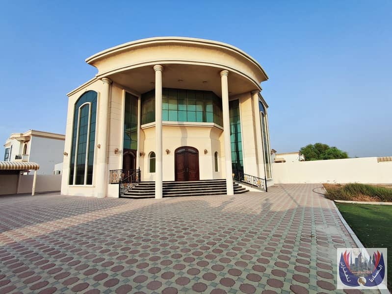 Villa with an area of ​​15,000 square feet, 8 master rooms, in Al Hamidiyah