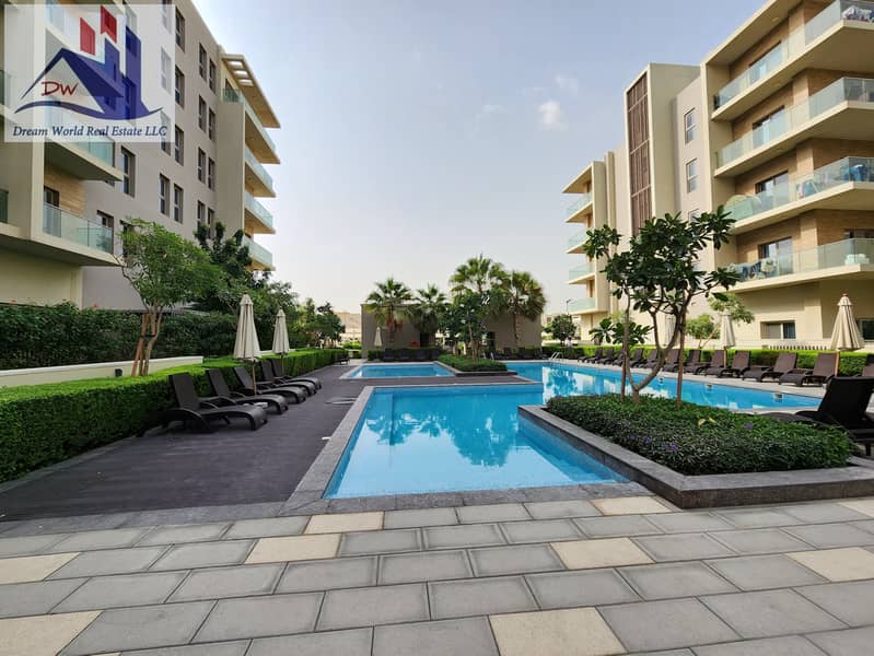 1BR Apartment in Al Zahia garden apartment compound with swimming pool and kids play area