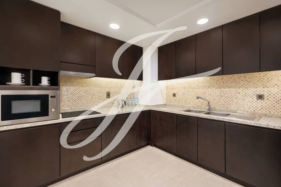 5 Family Three Bedroom Palm View Apartment - Fully Equipped Kitchen. jpg