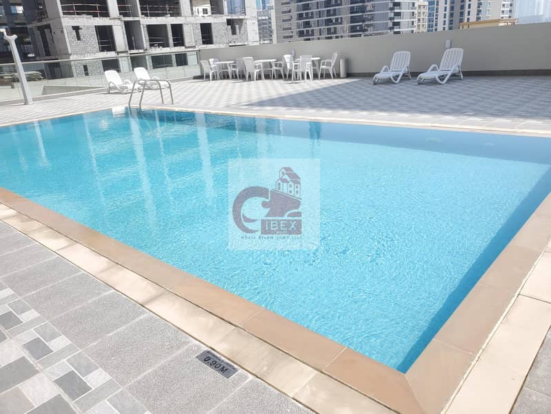 Brand new 1bhk with playing area 30 days free jym pool walking distance metro station on sheikh zayed road