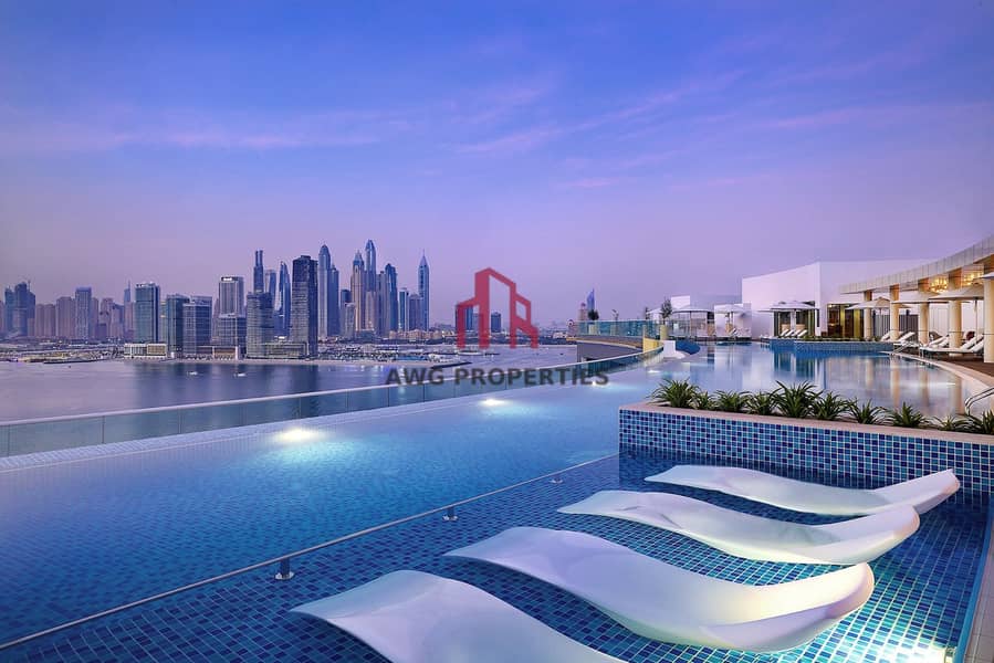 4 NH_Collection_Dubai_The_Palm_Pool View_Evening (1)-min. jpg