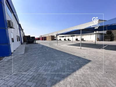 Warehouse for Sale in Jebel Ali, Dubai - Impeccable Warehouse Connected to a Spacious Office Building