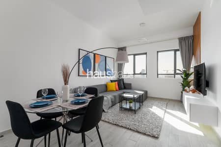 1 Bedroom Flat for Rent in Jumeirah Village Circle (JVC), Dubai - Living room