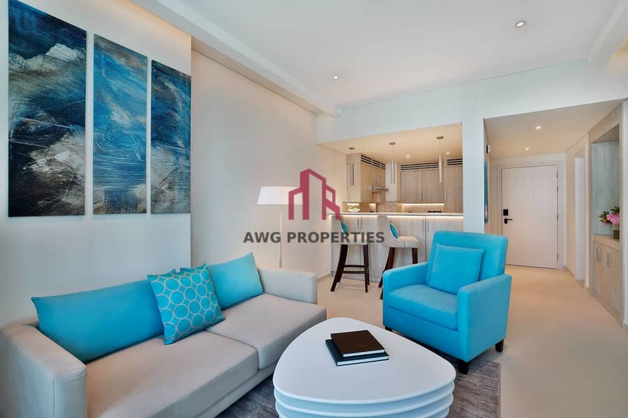 9 NH_Collection_Dubai_The_Palm_Superior_One_Bedroom_Sea_View_Apartment_Living_Area_2. jpg