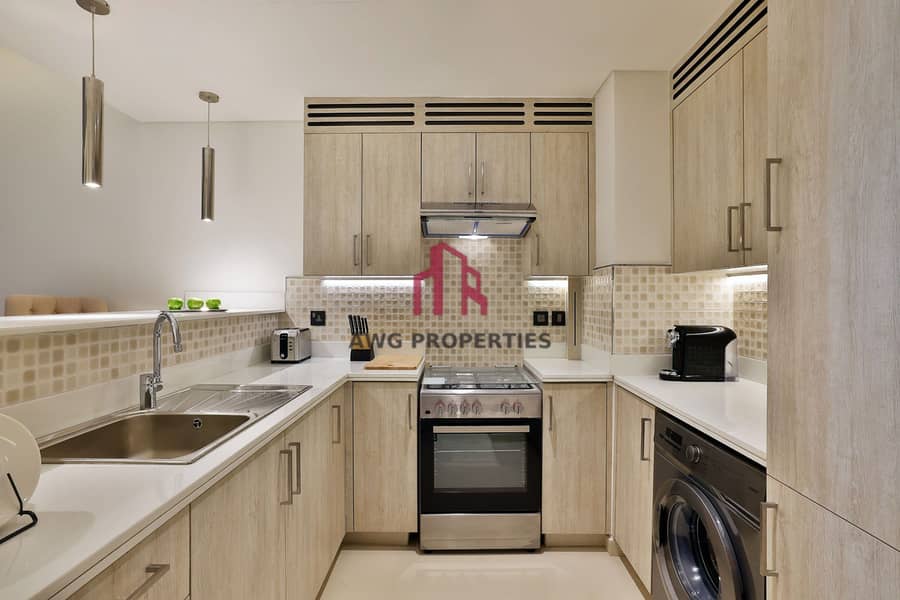 12 NH_Collection_Dubai_The_Palm_Superior_One_Bedroom_Sea_View_Apartment_Kitchen. jpg