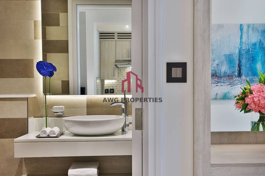 13 NH_Collection_Dubai_The_Palm_Superior_One_Bedroom_Sea_View_Apartment_Guest_Bathroom. jpg