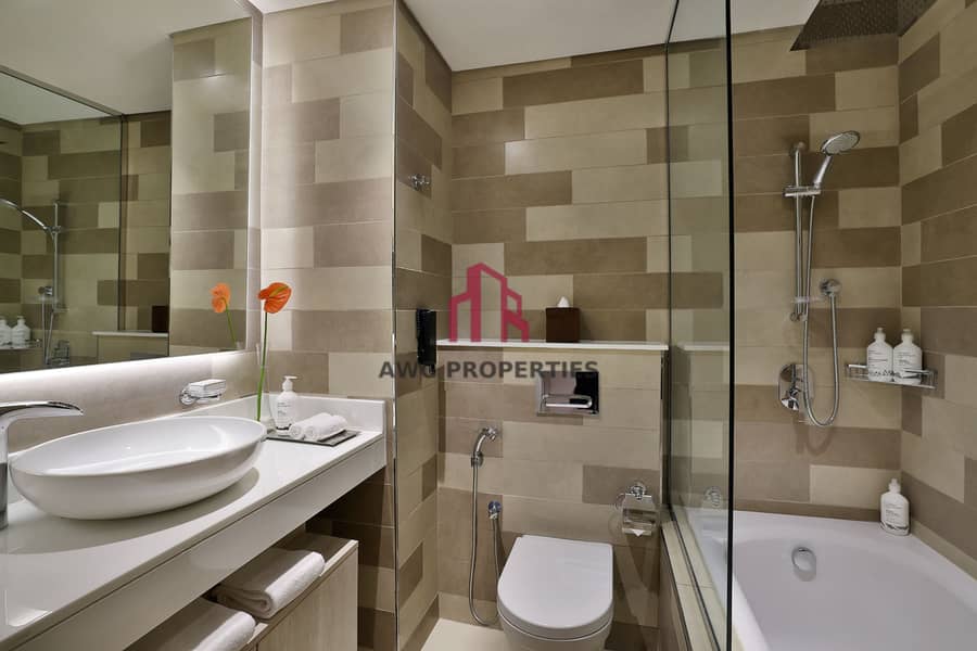14 NH_Collection_Dubai_The_Palm_Superior_One_Bedroom_Sea_View_Apartment_Bathroom. jpg