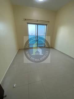 Chiller Free Spacious 2 Bhk CLose Kitchen , Balcony ,Parking for SALE IN CITY  Towers Ajman