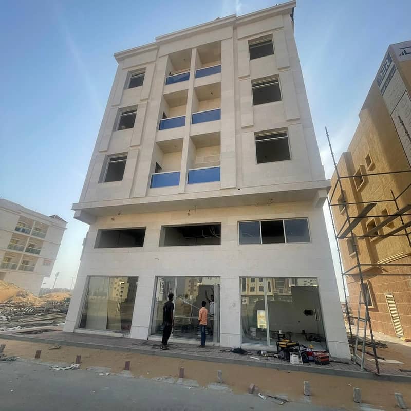 بنايه جديده للبيع بعجمان  منطقه العاليه - قريب محمد بن زايد موقع مميز  ارضي + 3 طوابق  9 شقق