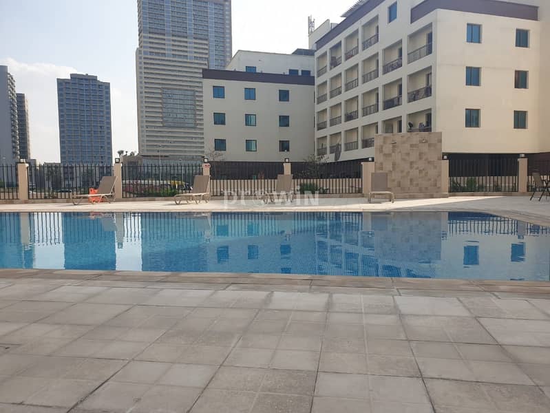 15 Luxurious 1BR | Well Maintained | Bright Pool View | Upto  4 Cheques!!!