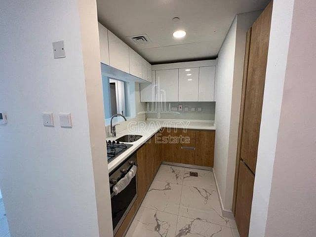 6 clean-and-nice-kitchen-area-with-good-lighting-al-raha-lofts-2. jpg