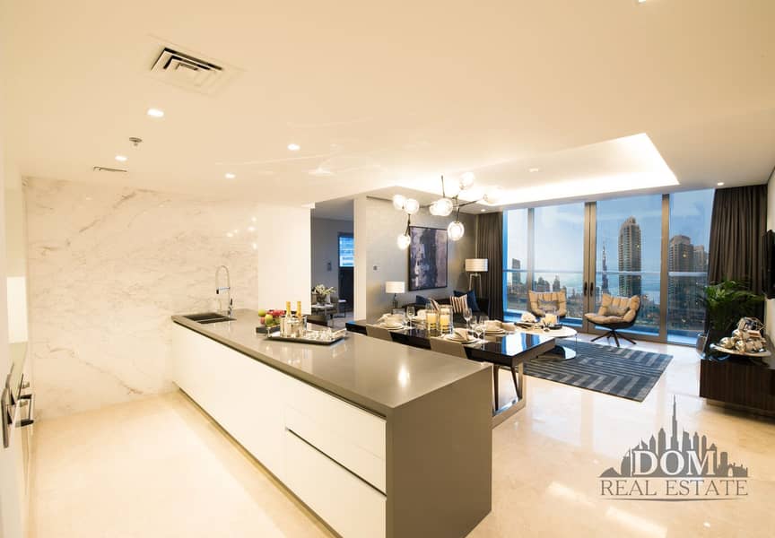 5 The Sterling by OMNIYAT Kitchen with Living. jpg