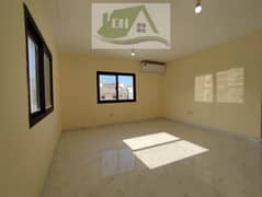spacious and sunny studio in Al Karamah near by all services