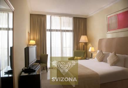 شقة فندقية 2 غرفة نوم للايجار في مدينة دبي للإنترنت، دبي - 1Bedroom-King-Bed-Premium-Apartm (1). jpg