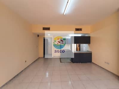 Studio for Rent in Sheikh Rashid Bin Saeed Street, Abu Dhabi - Spacious Central AC Studio with Balcony at Prime Location