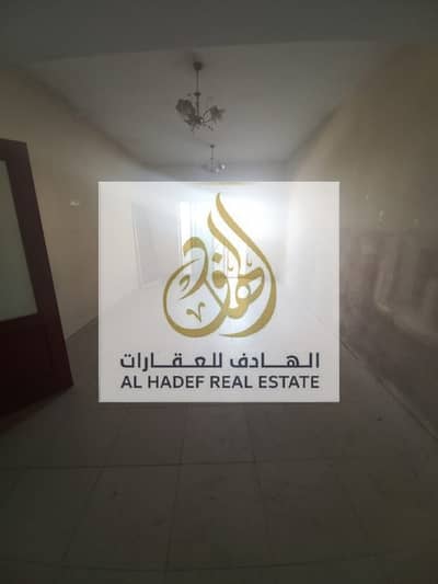 Two rooms and a hall, air conditioning, owned by the owner, 3 bathrooms with parking, a large area, a maids room in Al Rashidiya 2