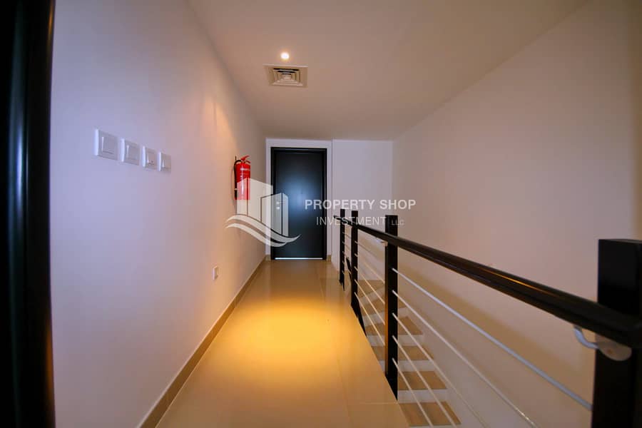 2-bedroom-villa-al-reef-contemporary-village-corridor. JPG 2-bedroom-villa-al-reef-contemporary-village-corridor. JPG