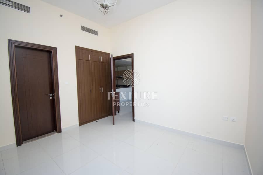 Spacious 1 Bedroom Apartment for Rent | Elite Residences 3 | Sports City