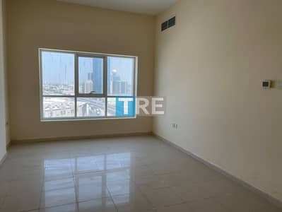 1 Bedroom Flat for Rent in Ajman Downtown, Ajman - SPACIOUS 1BHK FOR RENT IN AJMAN PEARL TOWER PRIME LOCATION WITH  COVERED CAR PARKING