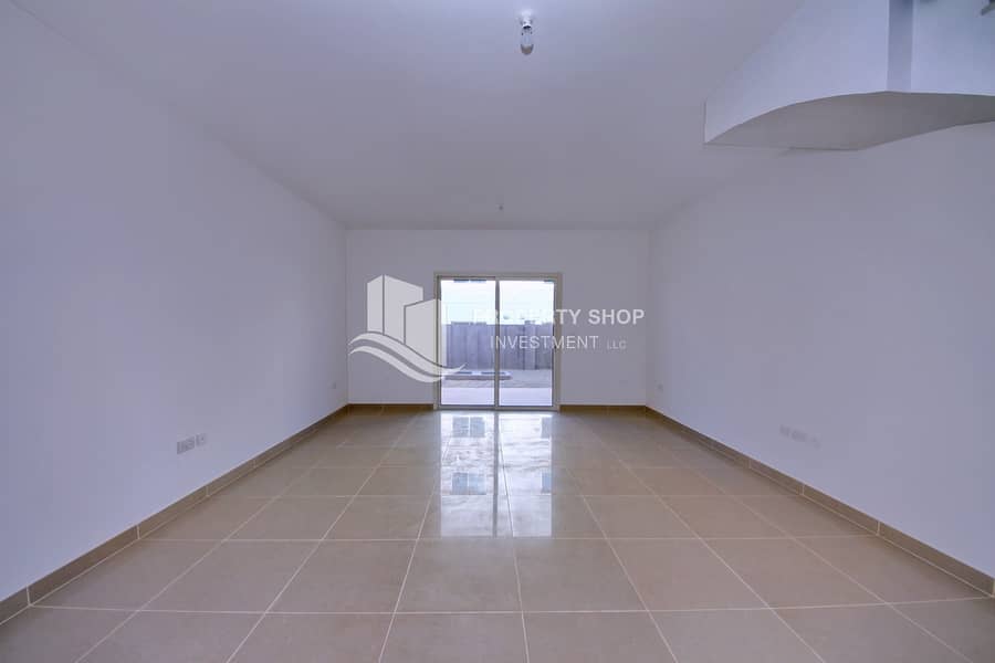 3-bedroom-abu-dhabi-al-reef-mediterranean-village-living-area. JPG 3-bedroom-abu-dhabi-al-reef-mediterranean-village-living-area. JPG