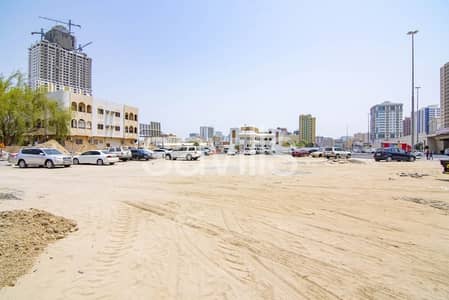 Mixed Use Land for Sale in Al Rashidiya, Ajman - Main road, corner mixed-used plot