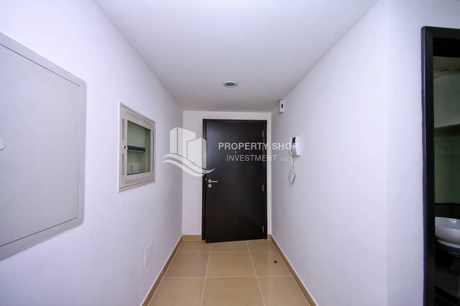 7 3 bedroom-apartment-abu-dhabi-al-reef-downtown-foyer. JPG