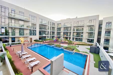 2 Bedroom Flat for Sale in Jumeirah Village Circle (JVC), Dubai - Two Bedroom | Study | Pool View