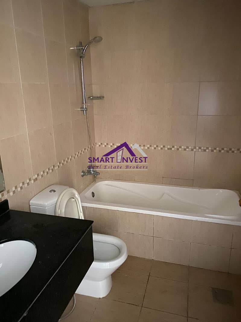 8 2 BR Apartment for sale in Liwan Queue point building 10B for AED 530K