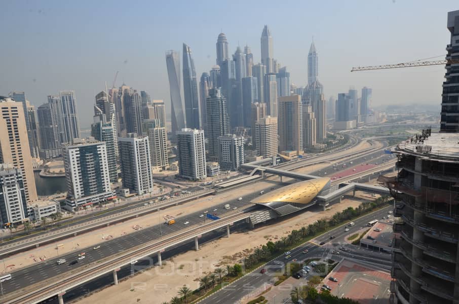 11 4 bedrooms facing Sheikh Zayed Road for rent