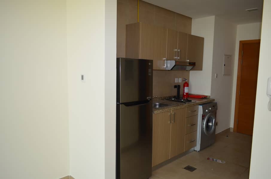 2 Bright New Building With Kitchen Appliances