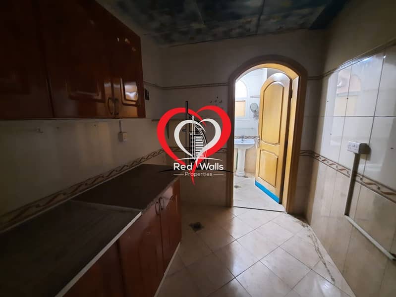 8 A BIG PARTITIONED STUDIO WITH SEPARATE KITCHEN AND BATHROOM LOCATED AT AL NAHYAN.