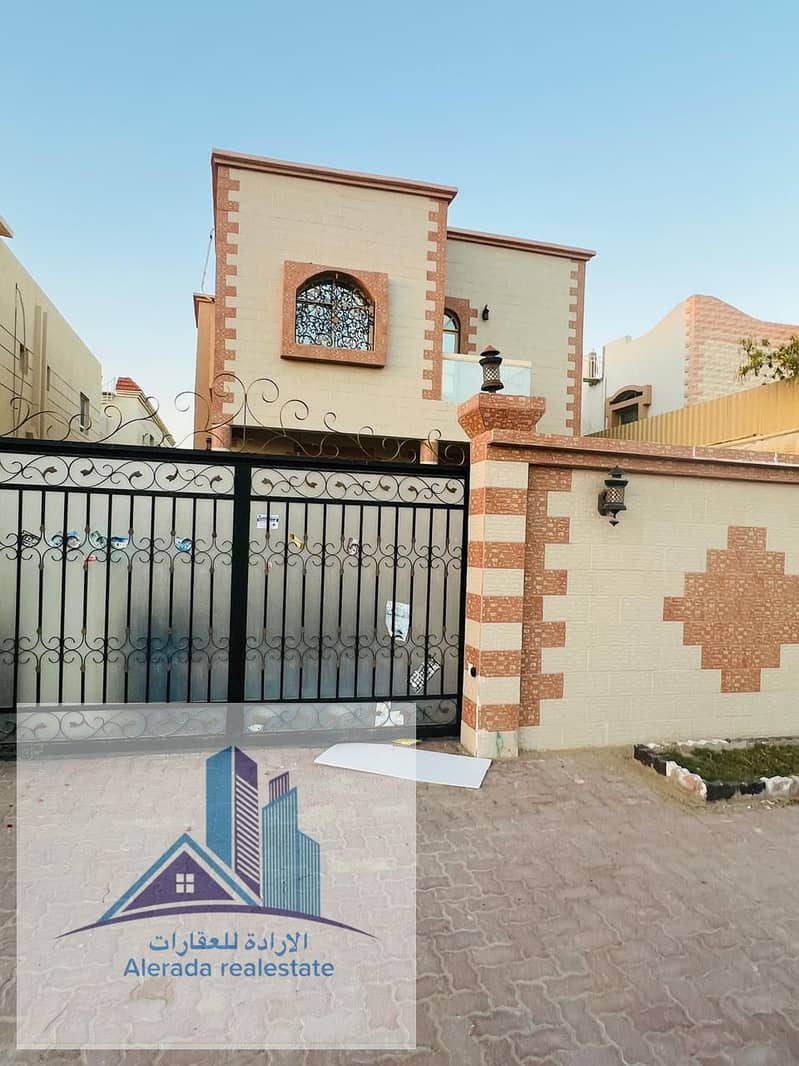 New villa for rent in Al Mowaihat, excellent finishing and decorations on an asphalt street, a large area fully equipped, a great location close to Ne