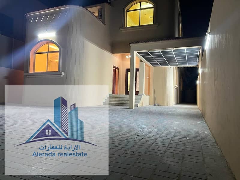 New villa for rent in Al-Rawdah, modern modern design, large area, prime location on Sheikh Ammar Street and the easy exit to Dubai and Sharjah