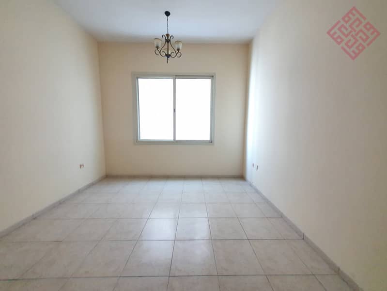 Spacious 2 bedroom with balcony is available for rent in Al Taawun