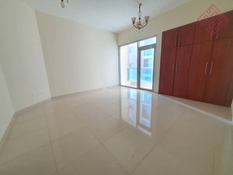 Luxerious 2BHK with Balcony +AC free +swimming poll free +Health club free +parking free is available for rent in Al Majaz 3 60000AED