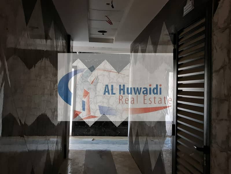 For sale a new building in Ajman, an area of ​​​​20 thousand duqm