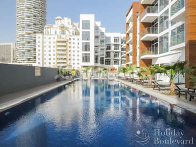 2 Bedroom Apartment for Rent in Jumeirah Village Circle (JVC), Dubai - Swimming pool