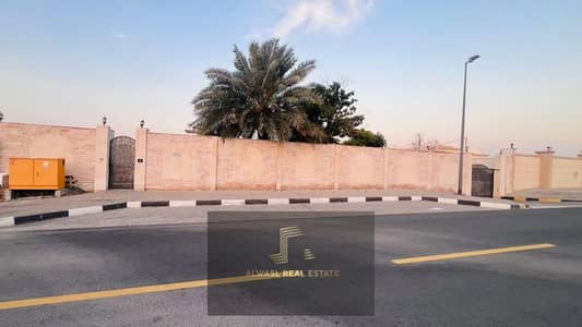 For rent a house in Sharjah, Al Khuzamia area, a great location, main Street