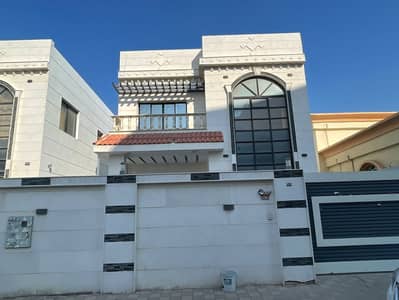 5 Bedroom Villa for Rent in Al Rawda, Ajman - Villa for rent in Ajman, Al Rawda 1 area

 Behind Al Hamidiya Police Station

 It consists of five master bedrooms and a living room

 A hall, a kitchen, and a maid's room with air conditioners

 The villa has the second inhabitant

 The villa has large a