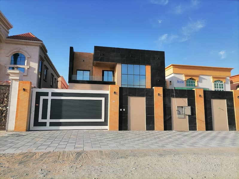 Modern villa in European design for sale near a sidewalk street, close to all services, with wide areas, lowest prices, and all banking facilities