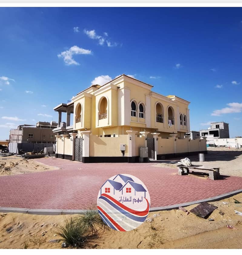 Villa for sale, personal finishing, excellent price, Ajman,  close to the main street, a large building area