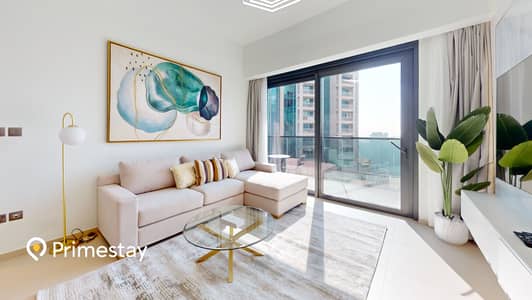 1 Bedroom Apartment for Rent in Downtown Dubai, Dubai - Primestay-Vacation-Home-Rental-LLC-Act-One-Act-Two-Living-Room. jpg