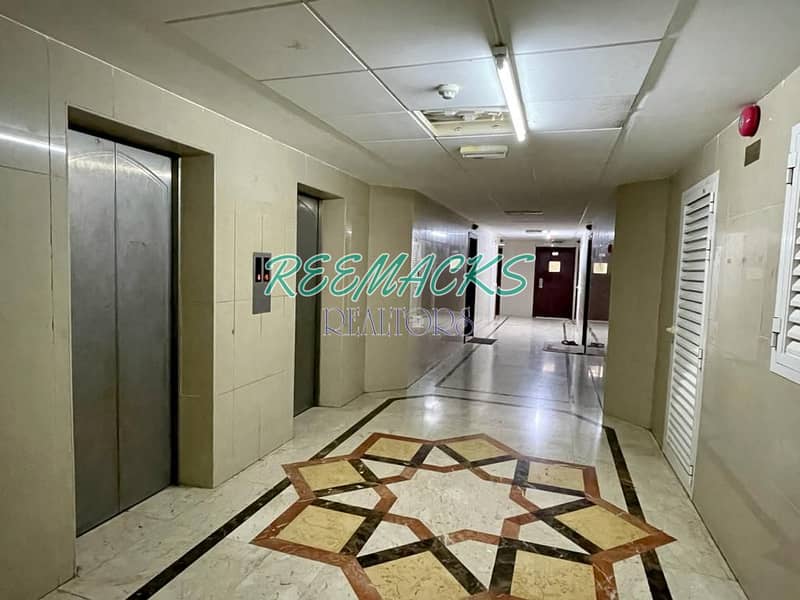 1 B/R HALL FLAT WITH SPLIT DUCTED A/C AVAILABLE IN AL GHUWAIR AREA  ALONG THE AL ZAHRA ST.