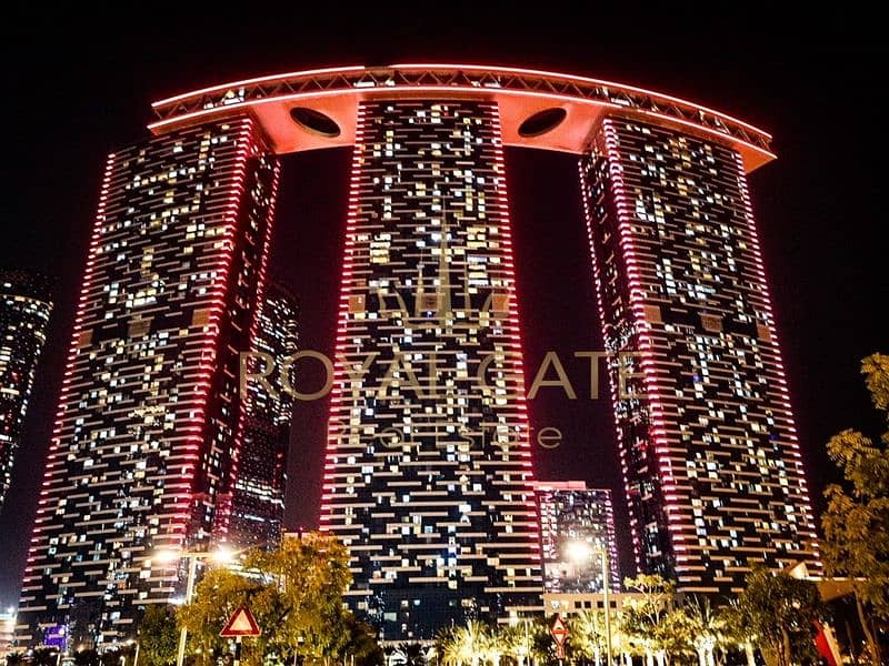 11 Abu-Dhabi’s-iconic-Gate-Towers-in-Al-Reem-Island-light-up-in-red-to-celebrate-the-entry-of-the-Hope-Probe-to-the-Mars-orbit-2 (1). jpg