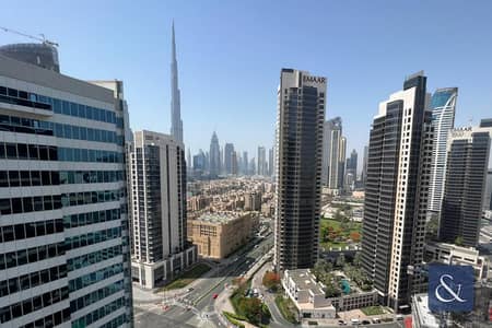 Studio for Sale in Business Bay, Dubai - High Floor | Furnished | Burj View | Rented