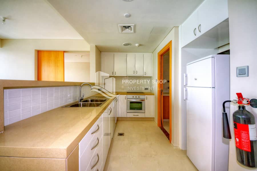 8 1-br-apartment-abu-dhabi-al-raha-beach-al-muneera-al-maha-2-kitchen. JPG