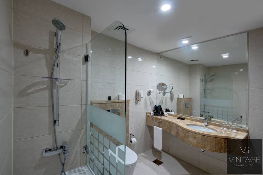 2 Ghaya Grand Hotel Dubai - Two Bedroom Bathroom 1. jpg
