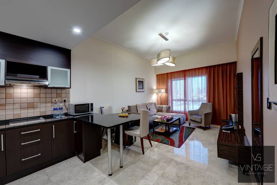 4 Ghaya Grand Hotel Dubai - Two Bedroom Living Room. jpg
