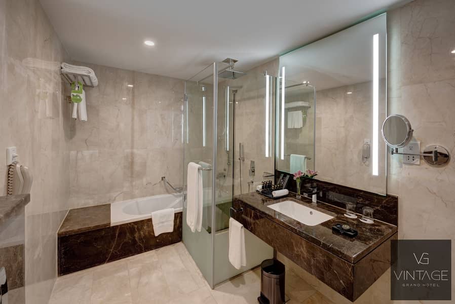 6 Ghaya Grand Hotel Dubai- Two Bedroom Bathroom 5. jpg