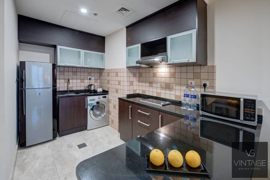 9 Ghaya Grand Hotel Dubai - One Bedroom Kitchen. jpg